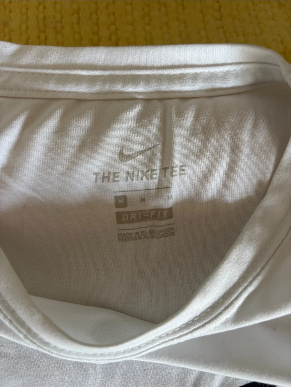 Nike White T-Shirt with Black Swoosh Logo